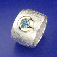 sim Schmuck Ring mit 18kt Gold und blauem Topas, rund, Silber